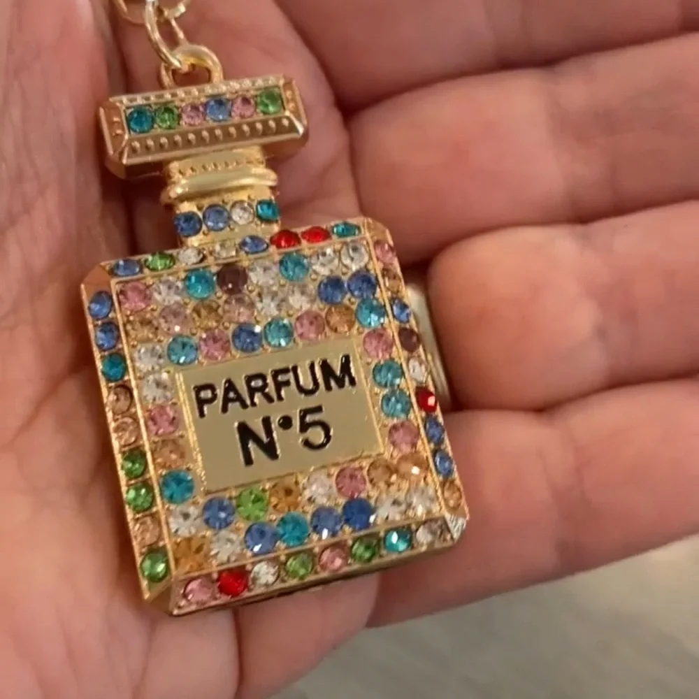 Elegant Rainbow crystal adorned Parfum bottle Goldtone keychain - Picture 5 of 7